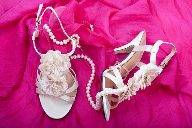Wedding shoes on pink silk