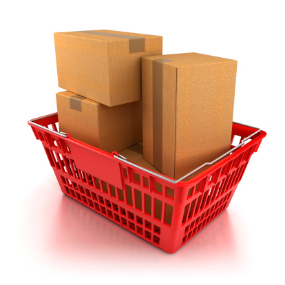 Shopping basket full of boxes - isolated on white with clipping path.