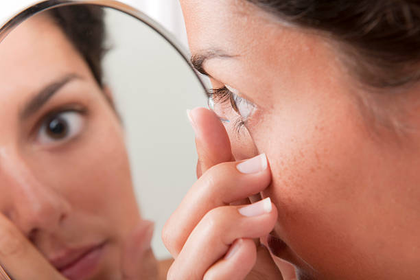 istock Inserting a Contact Lens in the Eye (XXXL) 182757730