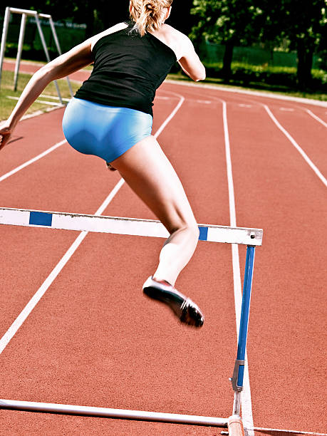 istock Woman Hurdling 182757859
