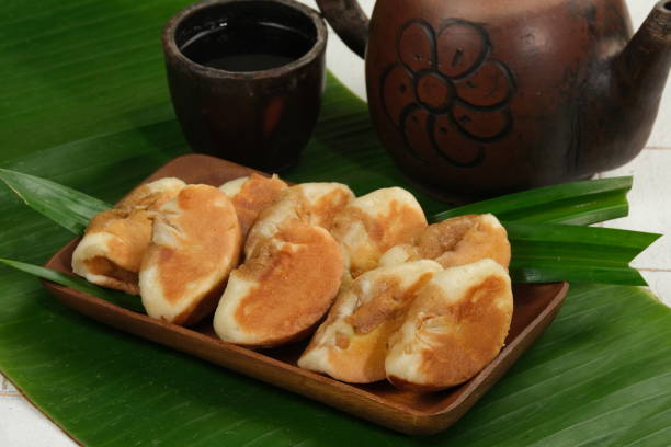 istock Kue Pukis or pukis cake , Traditional Javanese half-moon shaped pancakes. made from flour eggs yeast and coconut milk 1827579738