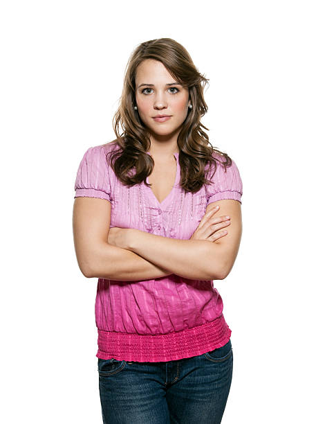 Front view / waist up of 20-29 years old adult beautiful caucasian female / young women running / exercising / standing in front of white background wearing sports clothing who is boredom / frustration with copy space