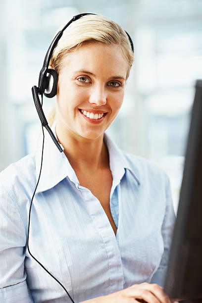 istock Portrait of a beautiful call center employee working on computer 182758293
