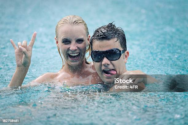 Monsoon Rain Fun Stock Photo - Download Image Now - Blue, Enjoyment, People