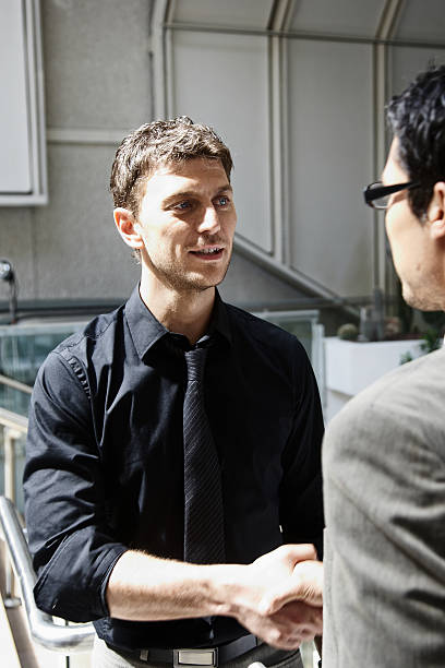 istock Two young businessman together 182758539