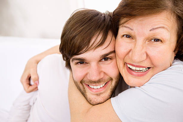 Mother embracing Son - Copy Space stock photo