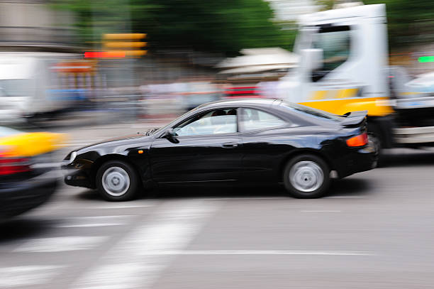 istock Fast motion blurred car in heavy traffic 182758845