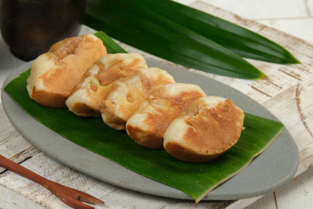 istock Kue Pukis or pukis cake , Traditional Javanese half-moon shaped pancakes. made from flour eggs yeast and coconut milk 1827590323
