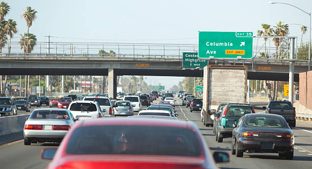 traffic Traffic on a freeway in Southern California. los angeles traffic jam stock pictures, royalty-free photos & images