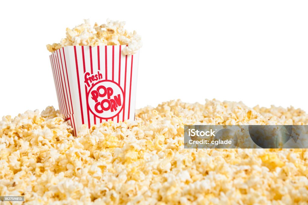 Popcorn Horizontal Movie Popcorn container and pile of popcornRelated Images: Popcorn Stock Photo