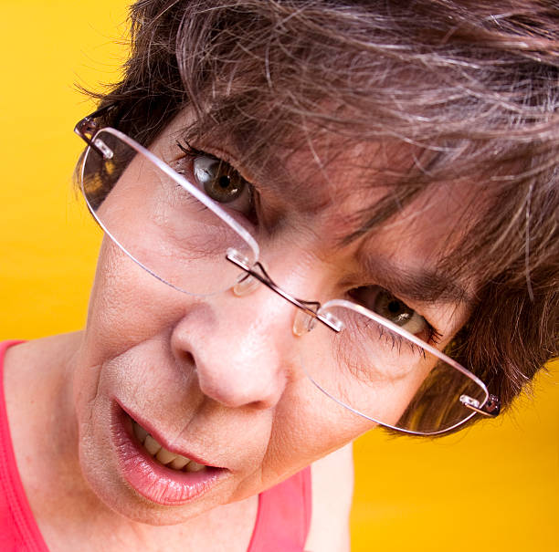 istock Goofy quizical expression on woman's face close-up 182760246