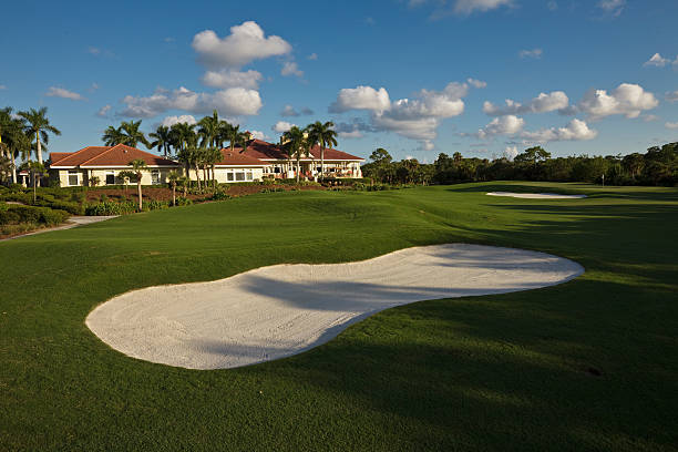 istock Golf Course Club House Overlooking 18th Hole Late Day 182760292
