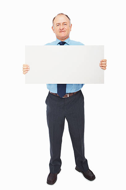 istock Confident mature businessman holding a blank billboard 182760616