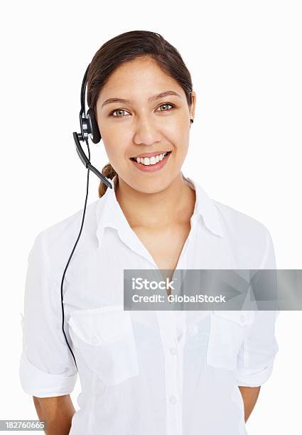 Portrait Of Call Center Employee Wearing Headset Against White Background Stock Photo - Download Image Now