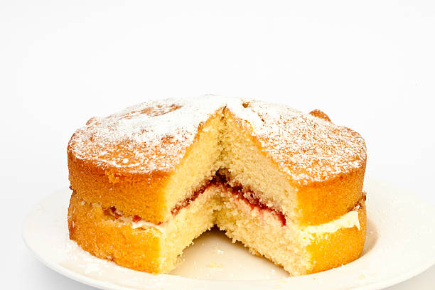 istock home baked jam and cream sponge cake with slice removed 182761051