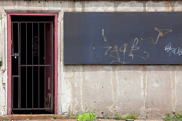 istock dilapidated urban building entrance 182761440