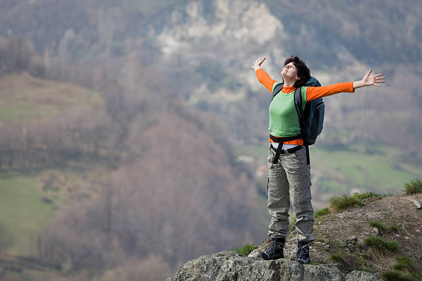 istock Hiker enjoying on the top of mountain 182761646