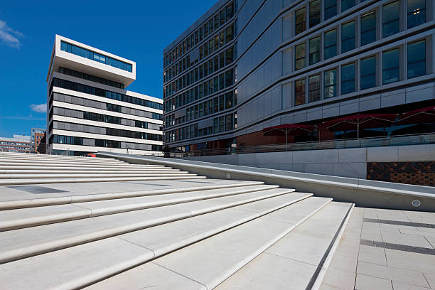 istock white office buildings and a piazza with steps 182761823