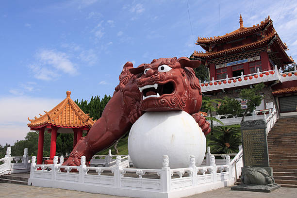 Montreal, Canada - July 5, 2024. Lion statue at Chinese Garden in Montreal Botanic Garden, Montreal, Quebec, Canada