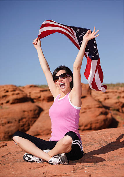 istock Pretty Young Woman with American Flag 182761991