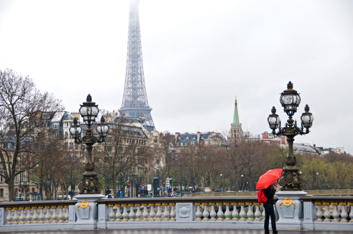 Woman with red umbrella