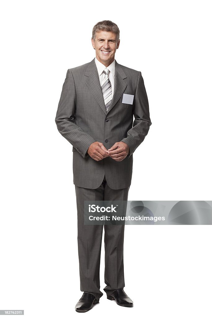 Sonriente hombre de negocios con nombre en blanco tarjeta de - Foto de stock de Adulto libre de derechos