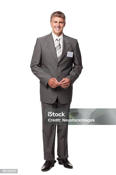 Uomo Daffari Sorridente Con Etichetta Nome Vuoto - Fotografie stock e altre immagini di Abbigliamento da lavoro - Abbigliamento da lavoro, Abbigliamento da lavoro formale, Abbigliamento elegante