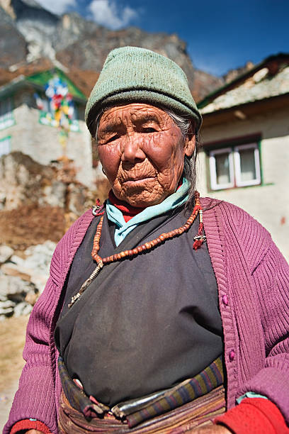 istock Nepali woman with rosary 182762675