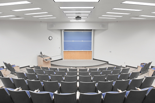 An empty modern college classroom.