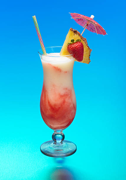 lavafluß cocktail auf blauem hintergrund - fruchtgarnierung stock-fotos und bilder