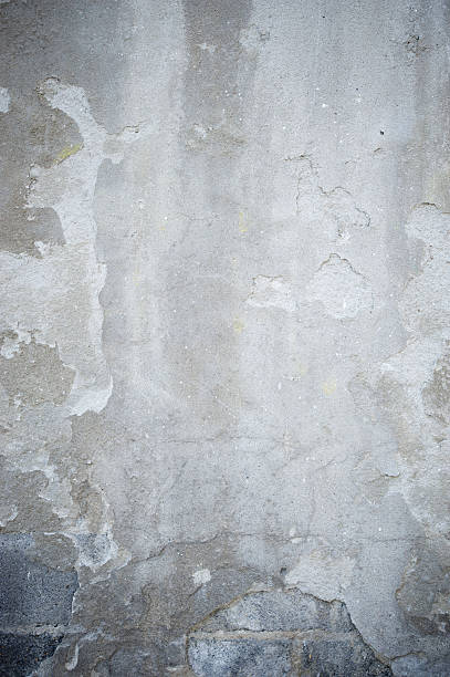 istock Gritty Grungy Cracked Concrete Wall Background 182763688