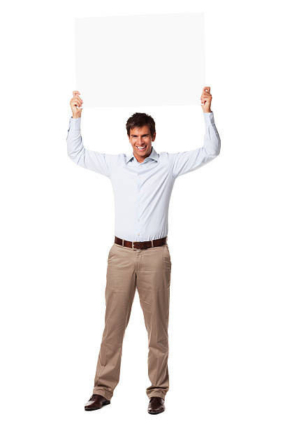 istock Handsome Businessman Holding Placard Overhead. Isolated 182763891