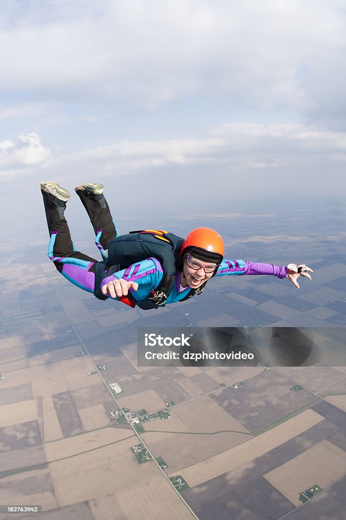 Royalty Free Stock Photo: Happy Woman Skydiving A happy female skydiver in freefallCheck out more of my skydiving images and videos. Skydiving Stock Photo