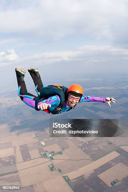 Royalty Free Stock Photo Happy Woman Skydiving Stock Photo - Download Image Now - Skydiving, Parachuting, Women