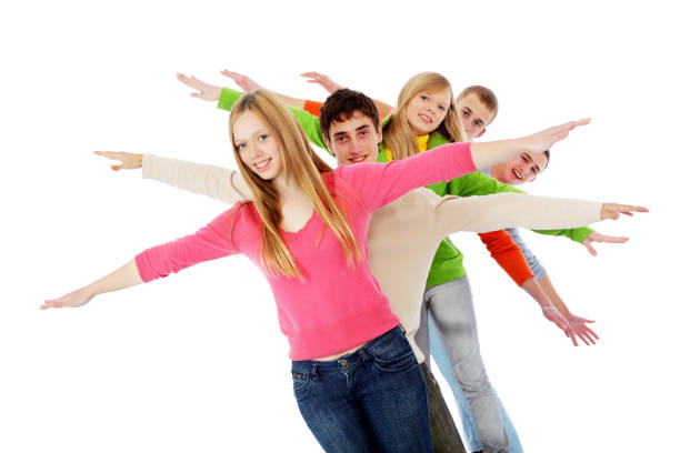 istock Teenagers standing in a row with spread arms. 182763977