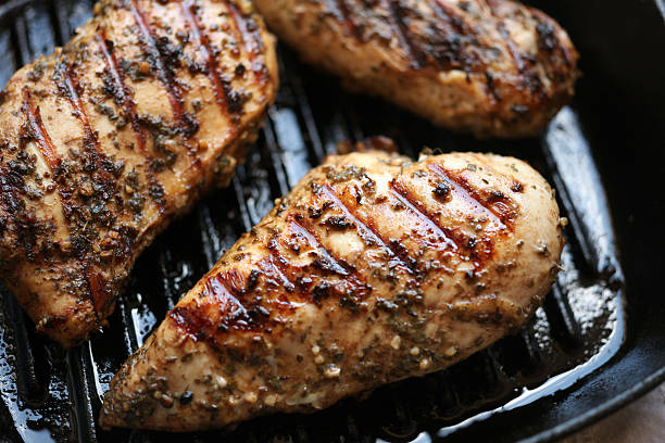 Grilled chicken breasts stock photo