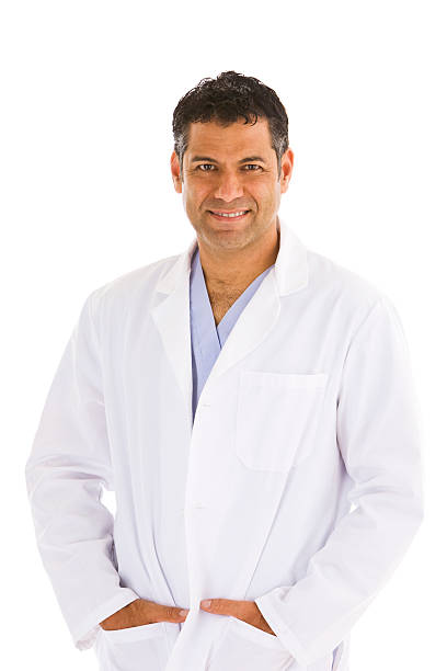 istock Hispanic male wearing lab coat hands in pockets 182764138