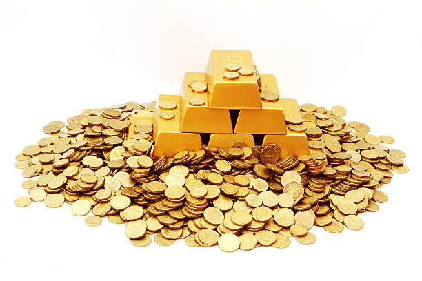 Gold Ingots and Coins stock photo