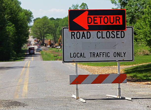 istock Rural Road Closed Detour Sign 182765675