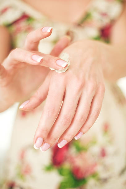 istock Woman applying hand creme 182765780