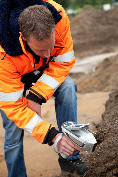istock Analysing the soil with HXRF and taking samples, environmetal research. 182766074