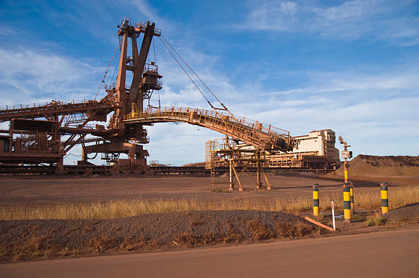 istock Stacker and Stockpile on Iron Ore Mine Site 182766295