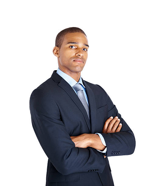 istock Handsome business man with hands folded against white 182766721