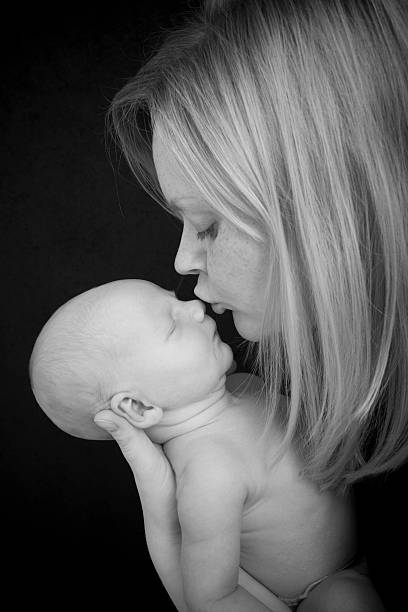 istock Mother Kissing Child 182766895