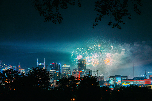 Elevated View of Downtown Nashville, Tennessee Skyline with Vibrant Colored Fireworks on 4th of July from the Southeast