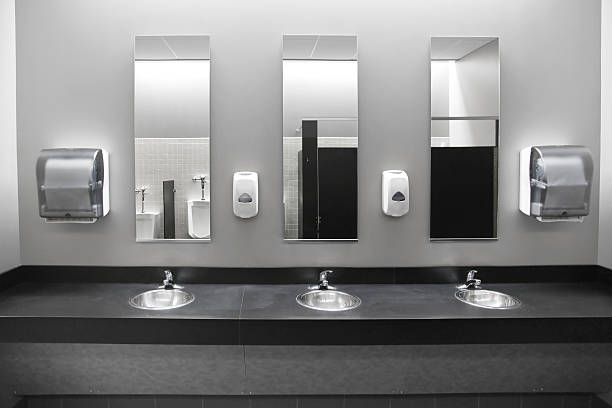 Restroom Sinks A public restroom's sinks and counter. public restroom photos stock pictures, royalty-free photos & images