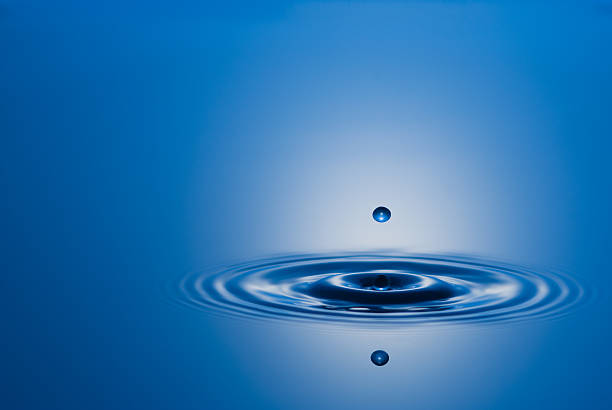 istock Closeup Stop Action Water Drop in Blue 182767415
