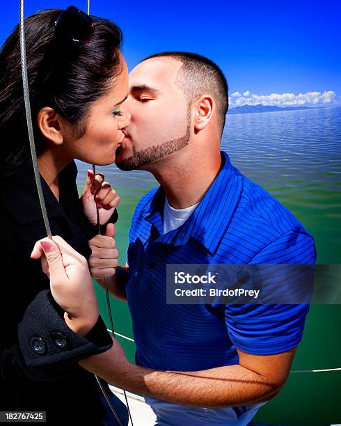 Romantic Day Out Sailing Stock Photo - Download Image Now - Blue, Couple - Relationship, Kissing