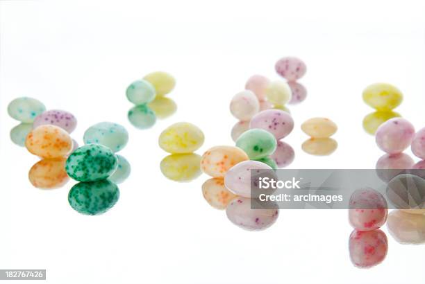 Speckled Jelly Beans On Reflective Surface Stock Photo - Download Image Now - Candy, Celebration Event, Food