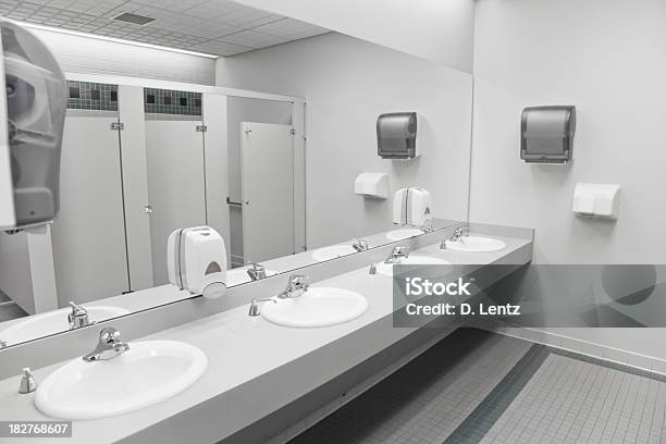 An Empty Commercialpublic Restroom Stock Photo - Download Image Now - Public Restroom, Mirror - Object, Bathroom